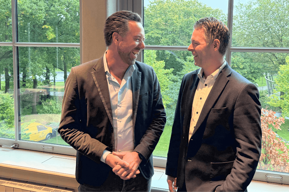 Tim Rosman en Jeroen van Ark - voorzitterswissel MPI